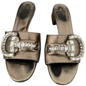 Metallic Gucci dark gold leather slides